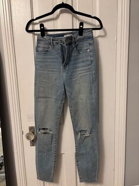 Good American Light Blue Skinny Jeans with Knee Rips